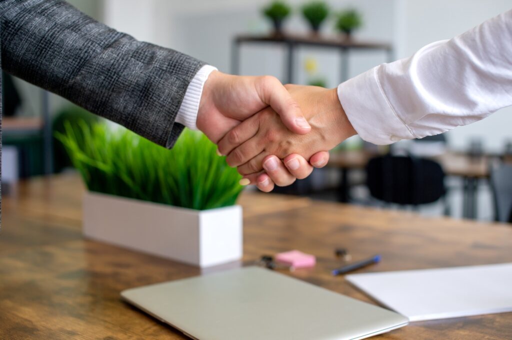 Professional handshake in a real estate transaction